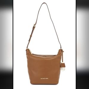 Michael Kors Lupita Medium Messenger bag in brown pebbled leather.